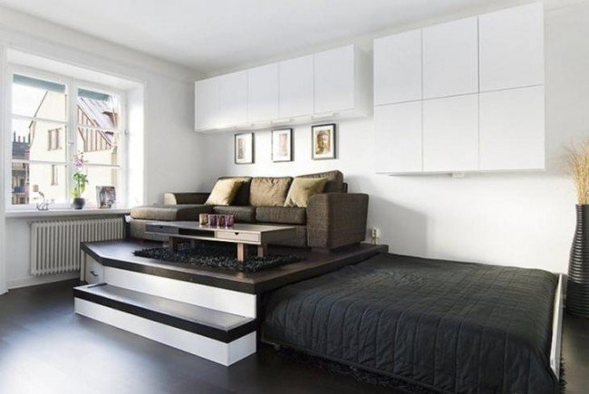 кровать в дизайне однокомнатной квартиры