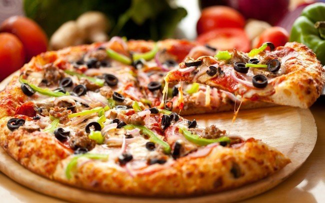 В какой стране едет пиццы больше всех ?